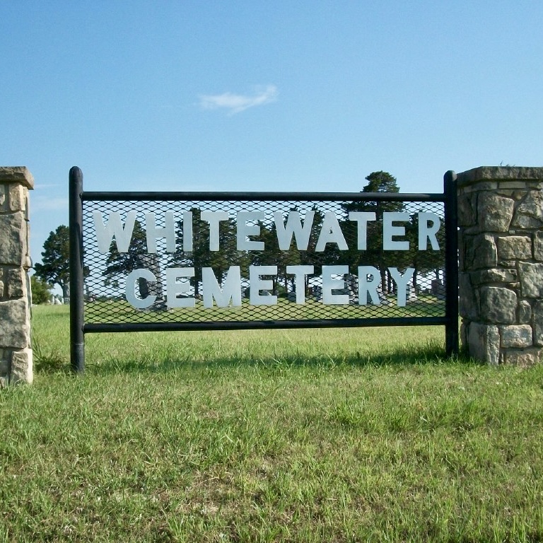 Sign stating Whitewater Cemetery located at the cemetery