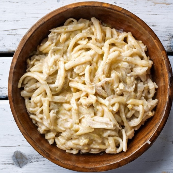 a bowl of chicken and noodles