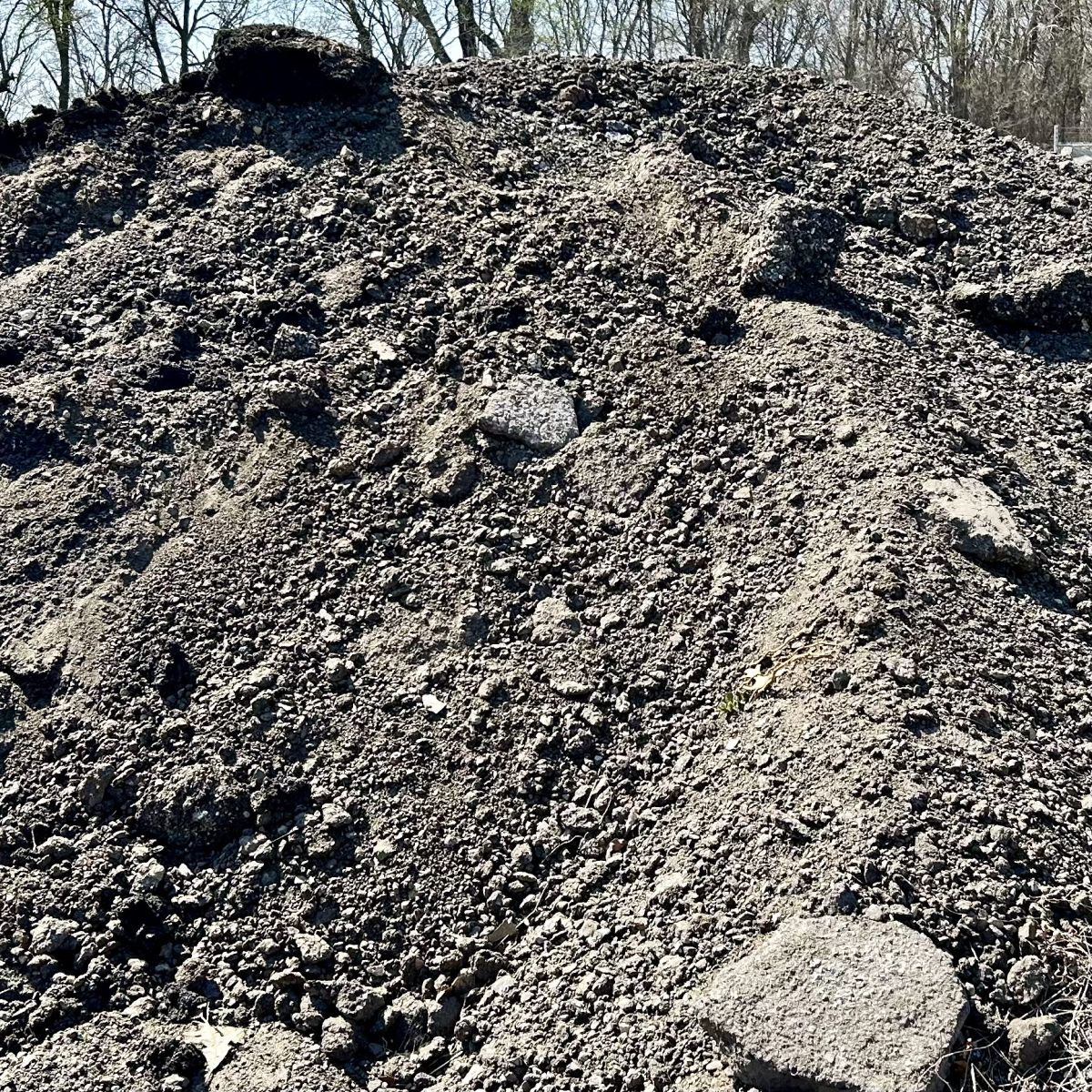 crushed asphalt with large chunks at dump