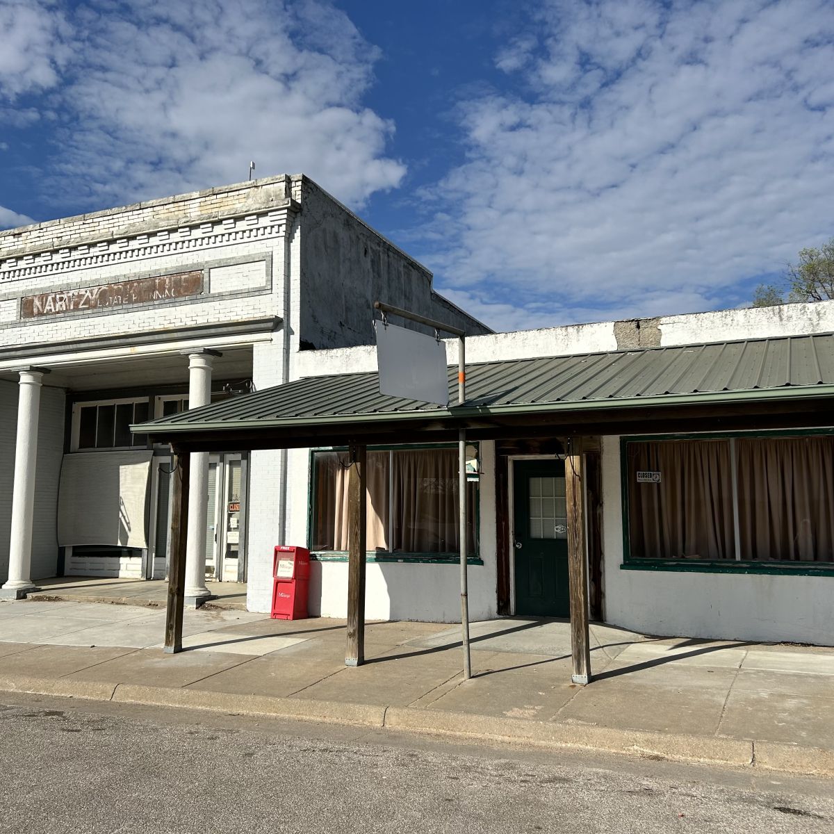 two buildings, now empty