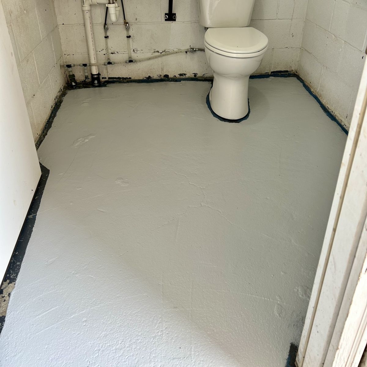 Floors totally painted with grey garage floor paint
