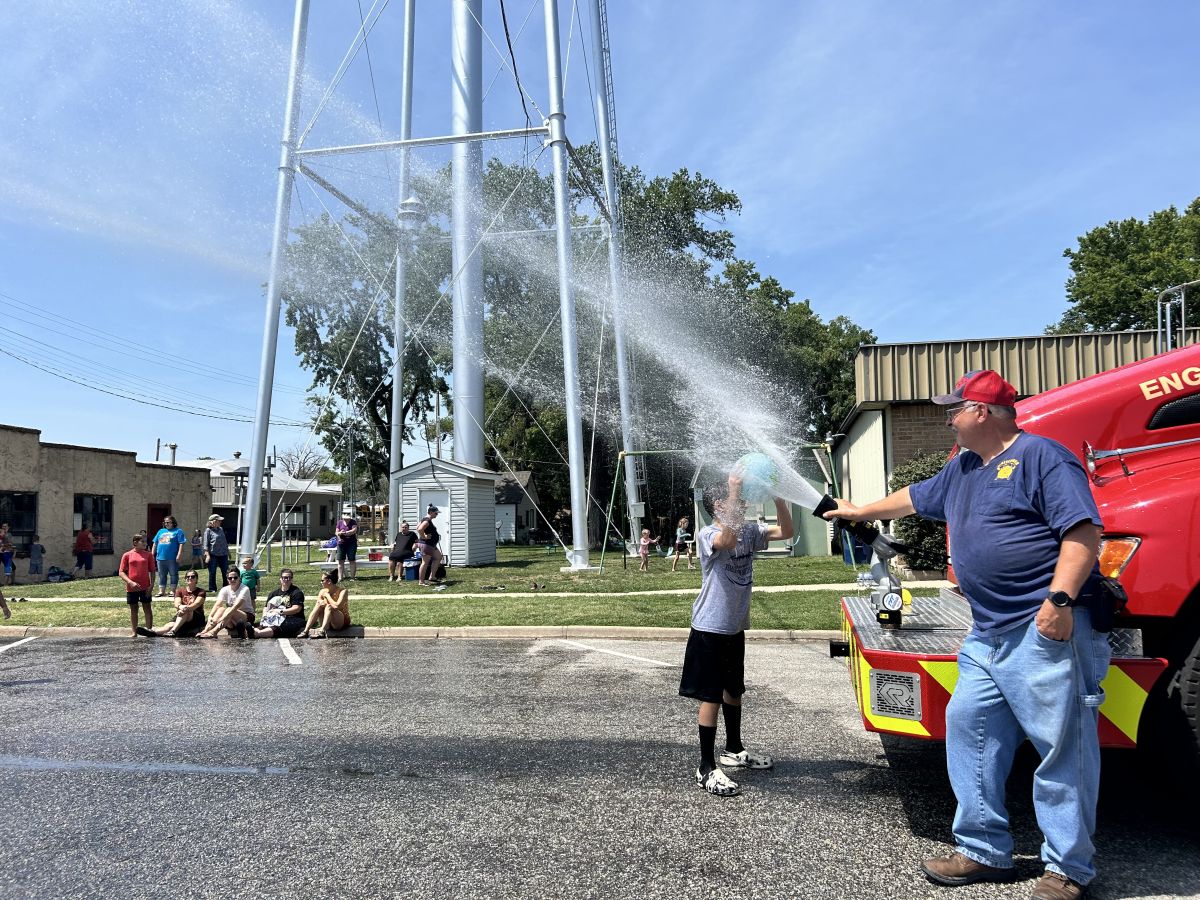 Fire Truck spraying citizens to cool off in the summer