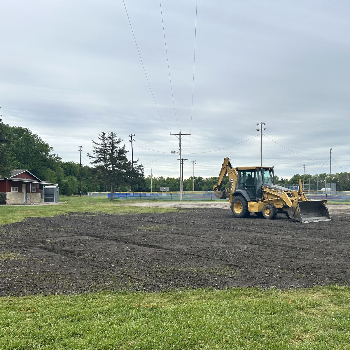 Donated Asphalt MIllings are being put out at the Scout House/Ballfield 3 to creat better parking options.
