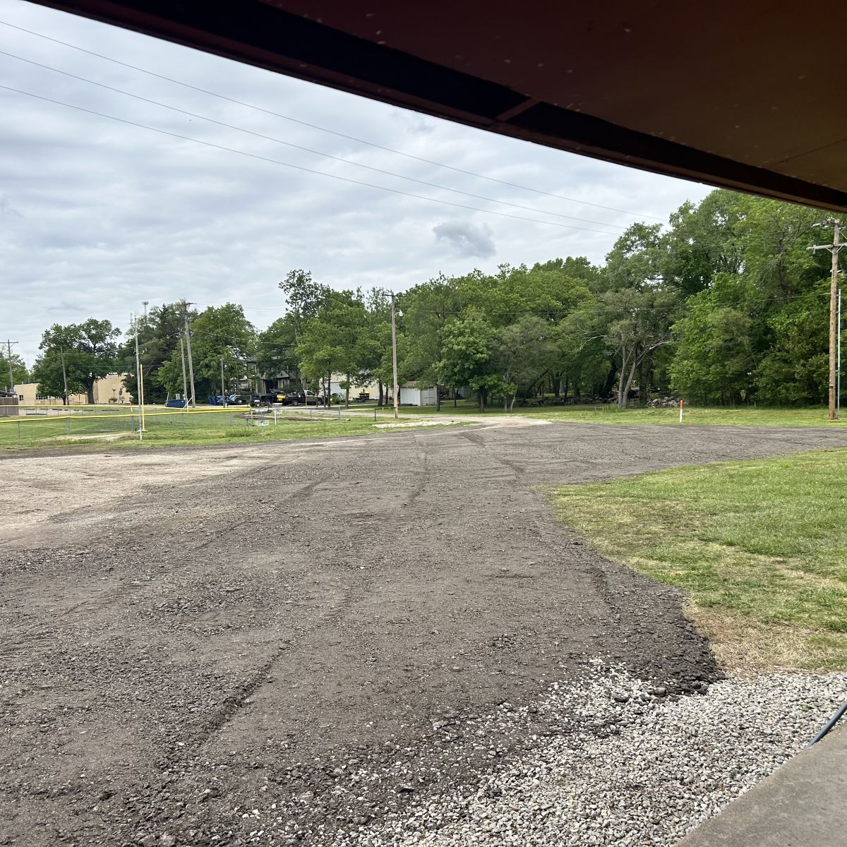 asphalt millings donated by Dustrol is helping improve out parking area