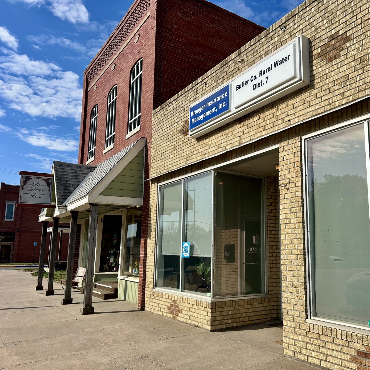 two buildings housing 3 businesses