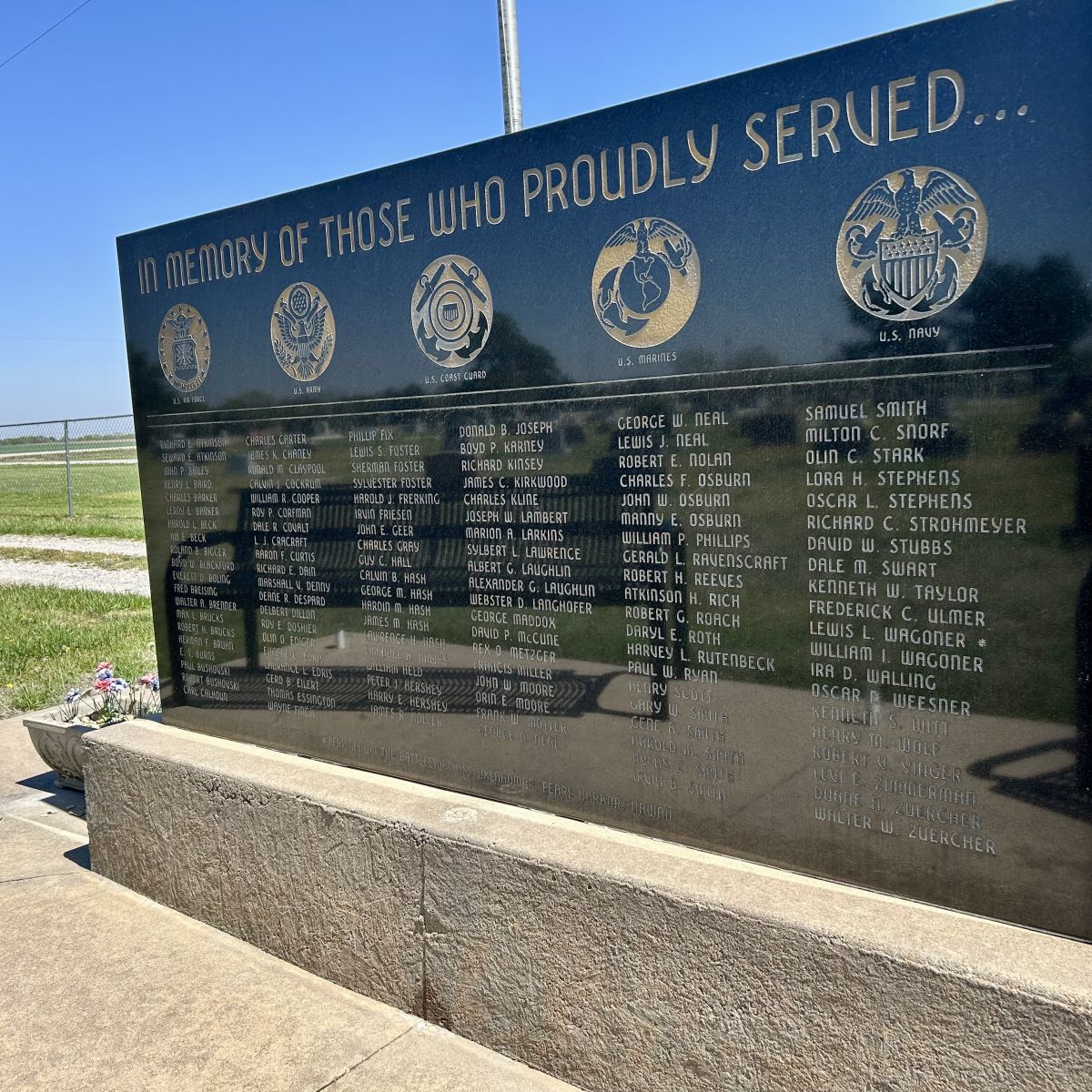Military Service memorial with each branch and multiple names of those who served