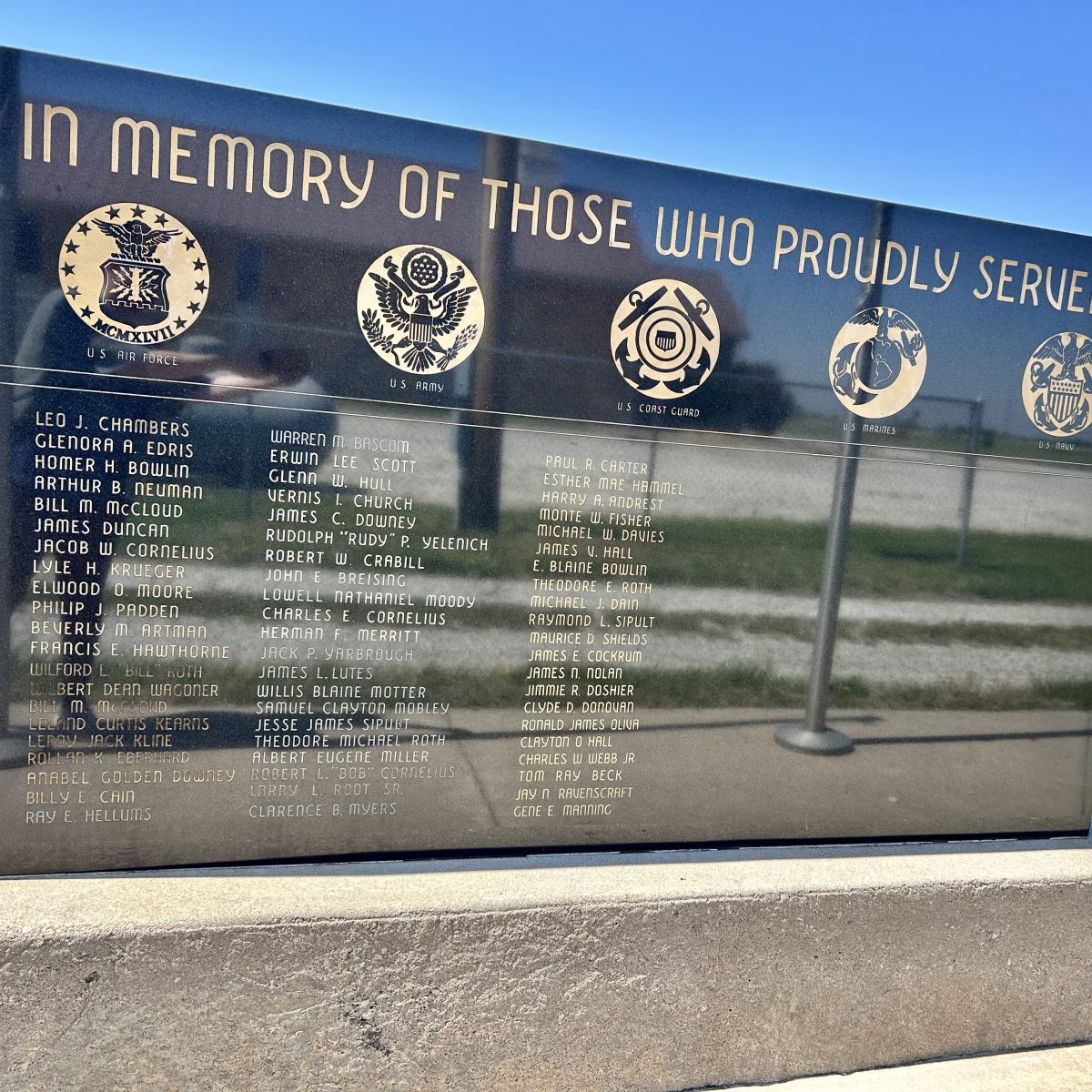 Military Service memorial with each branch and multiple names of those who served