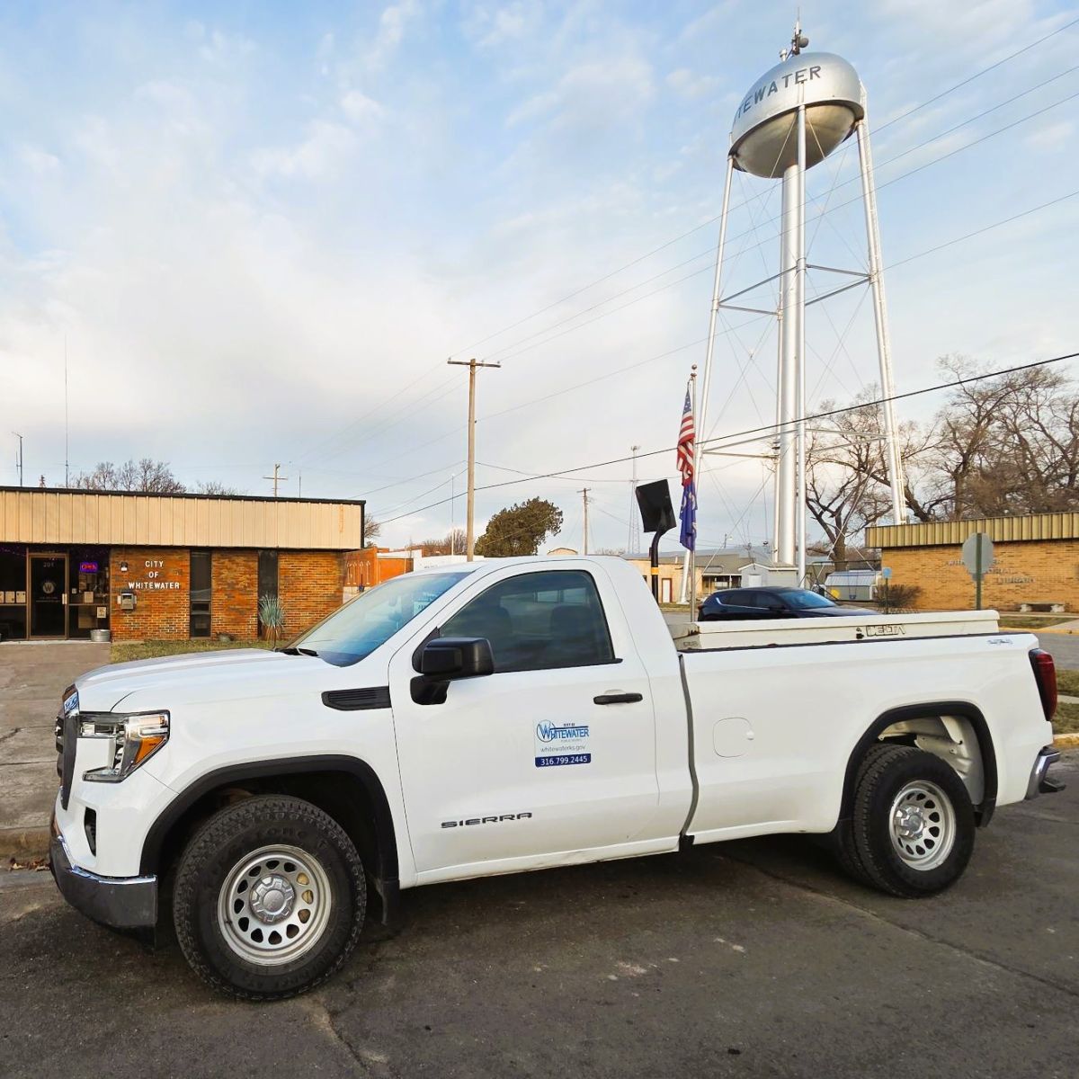 a white 2022 GMC truck, replaces truck totalled last year.