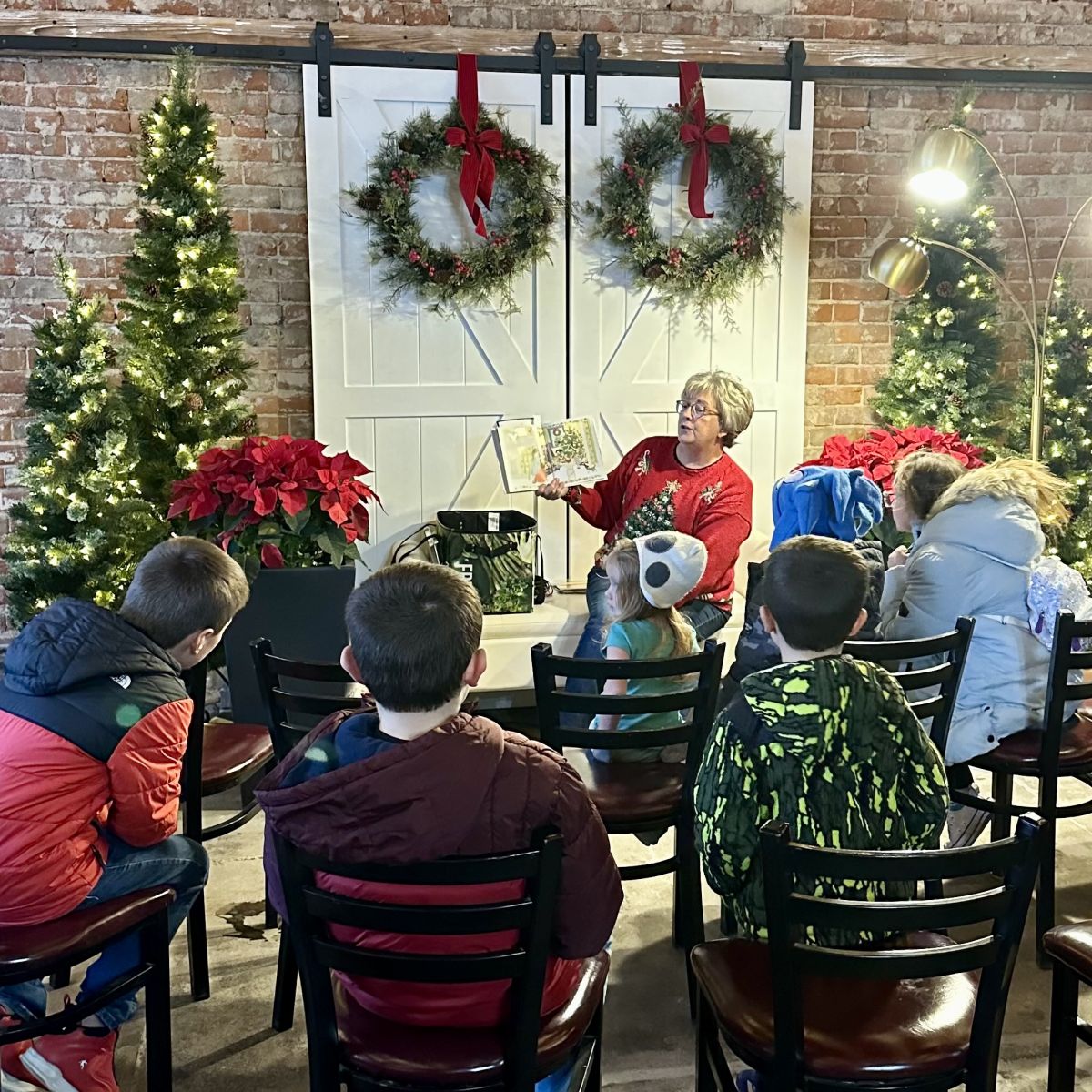 Ms. Julie reading to the kiddos