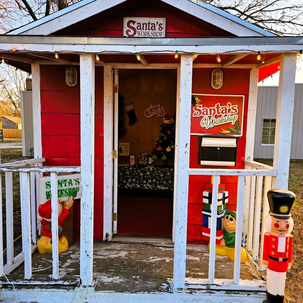 A small shed decorated as Santa's Workshop