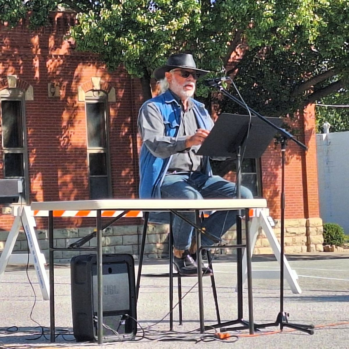 Darryl Claassen read scripture during the community service on Main, then a potluck