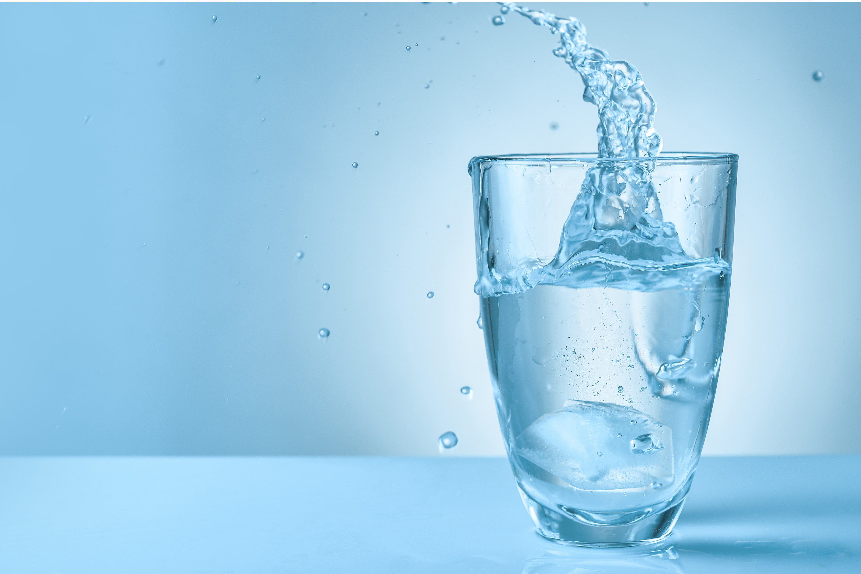 water pouring into a glass